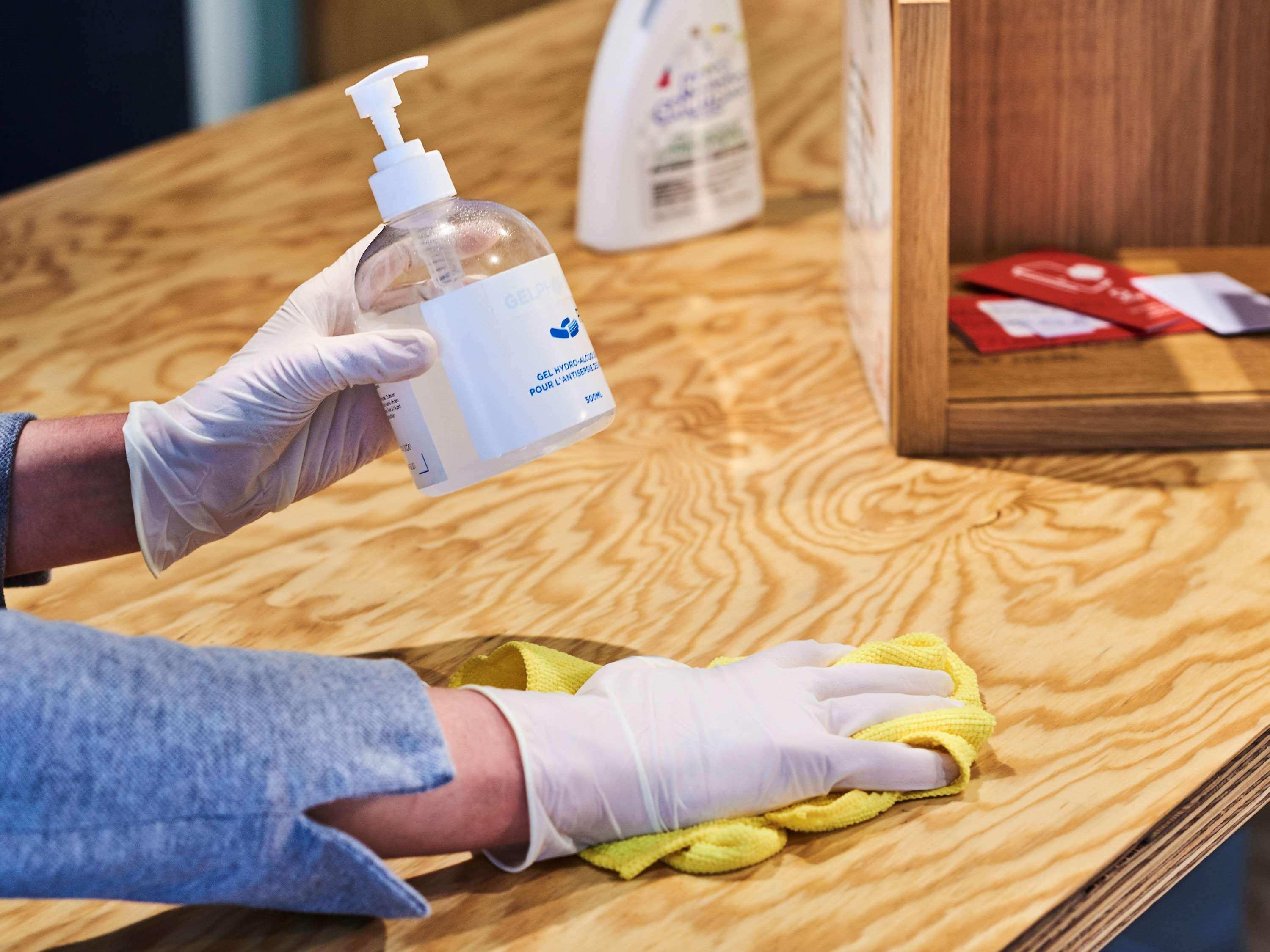 Novotel Chennai Sipcot المظهر الخارجي الصورة Disinfection of a table with a disinfectant